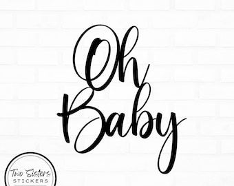 May include: Black and white calligraphy design that says "Oh Baby" on a white brick background.
