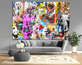 May include: A large rectangular wall art piece featuring a vibrant graffiti-style collage. The artwork includes images of a giraffe, lion, panda, elephant, Superman, and Mickey Mouse, layered with neon pink outlines, paint drips, and text.
