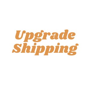 May include: Orange text on a white background reads "Upgrade Shipping".