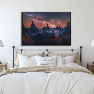 May include: A woman in a red dress sits on a rocky cliff overlooking a vast, mountainous landscape. The sky is filled with a vibrant sunset and a starry night sky.