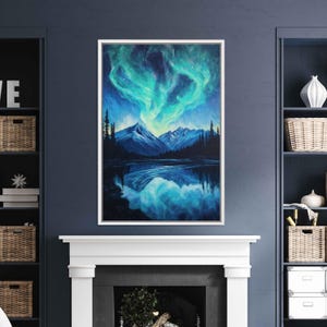 May include: A framed landscape painting depicts a mountain range under a vibrant aurora borealis. The artwork features a lake reflecting the mountains and the swirling green and blue lights of the aurora. The painting is set in a white frame.