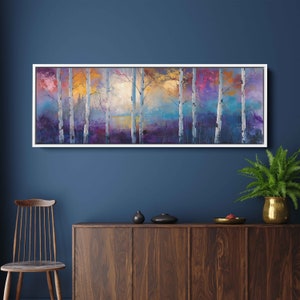 May include: A long, horizontal painting of a forest scene with a row of birch trees in the foreground. The trees are white with black bark and are silhouetted against a colorful background of purple, blue, and yellow. The painting has a white frame.