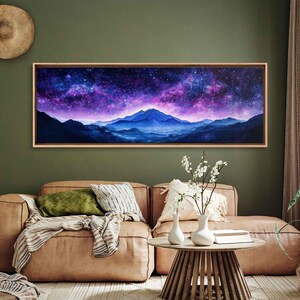 May include: A long, horizontal painting of a purple and blue starry night sky over a mountain range. The mountains are silhouetted against the sky, and the stars are scattered across the canvas.