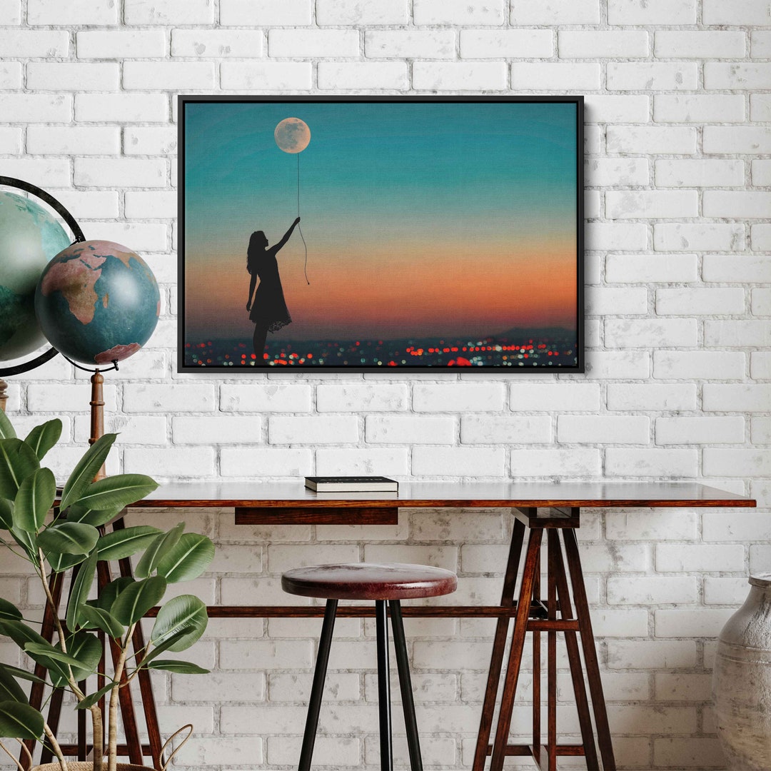 Woman Holding String to Balloon Moon During Sunset Wall Art Canvas ... image.