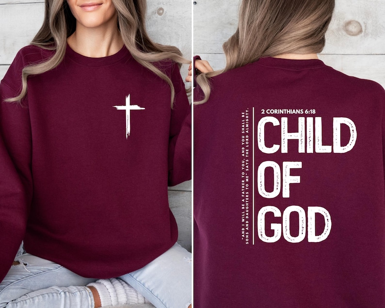 May include: Burgundy sweatshirt with a white cross on the front and the text "CHILD OF GOD" and "2 CORINTHIANS 6:18" on the back.