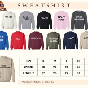 Pode incluir: Uma tabela de tamanhos para sweatshirts em v&aacute;rias cores, incluindo branco, cinza esportivo, preto, rosa claro, cinza escuro, azul royal, vermelho, vinho, verde militar, azul marinho e areia. A tabela mostra as medidas de largura e comprimento em polegadas para os tamanhos S, M, L, XL e 2XL.