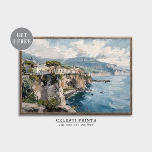 May include: A painting of a coastal town with buildings on a cliff overlooking the ocean. The sky is blue with white clouds. The water is a deep blue with whitecaps. The painting is framed in a gold frame.