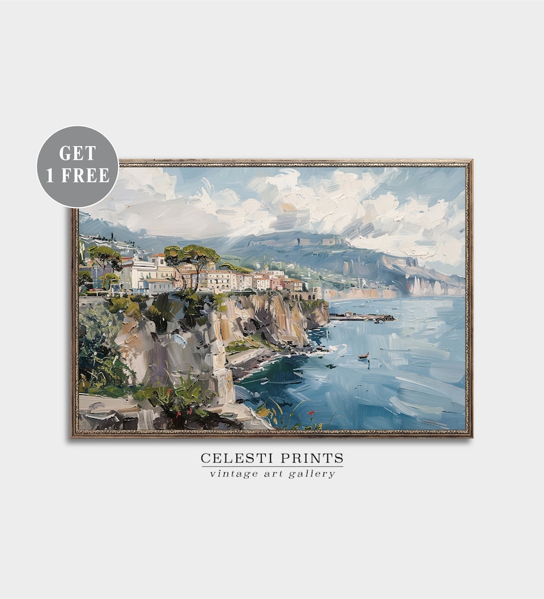 May include: A painting of a coastal town with buildings on a cliff overlooking the ocean. The sky is blue with white clouds. The water is a deep blue with whitecaps. The painting is framed in a gold frame.