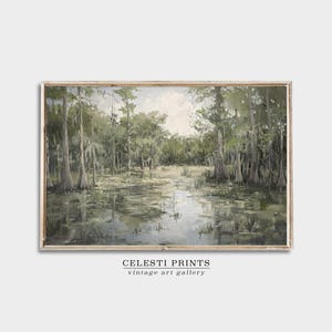 May include: A vintage painting depicting a swamp scene with tall trees and still water. The trees have moss hanging from their branches and the water reflects the sky and trees. The painting is framed in a light wood frame.