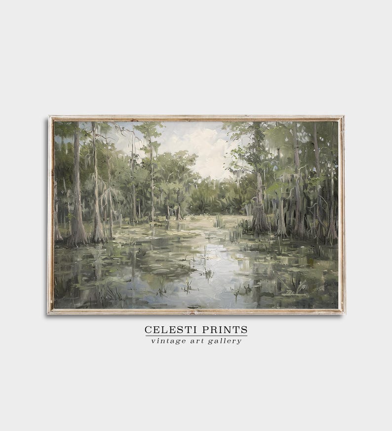 May include: A vintage painting depicting a swamp scene with tall trees and still water. The trees have moss hanging from their branches and the water reflects the sky and trees. The painting is framed in a light wood frame.