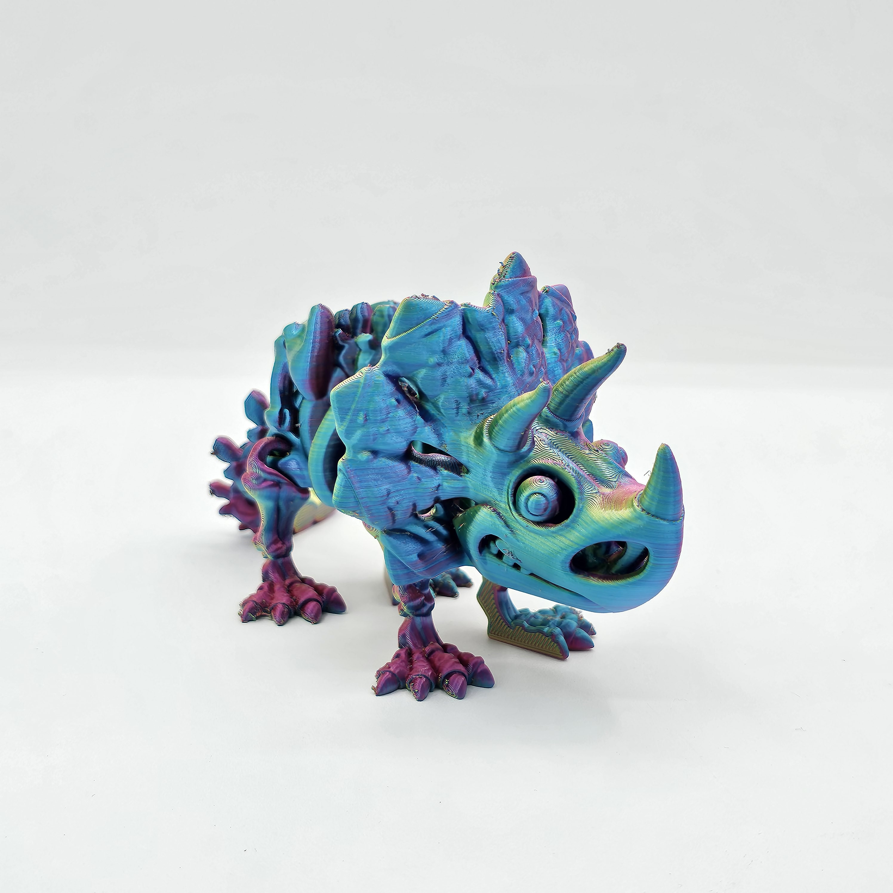 Flexi Triceratops: Roar into the Past with Poseable Prehistoric Majesty!