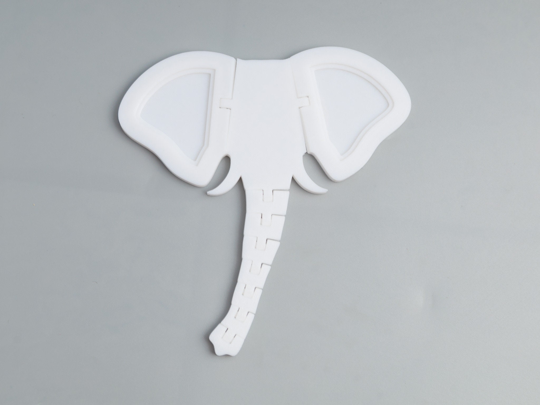 3D Printed Elephant Head with Moving Ears: Wall Decor or Toy