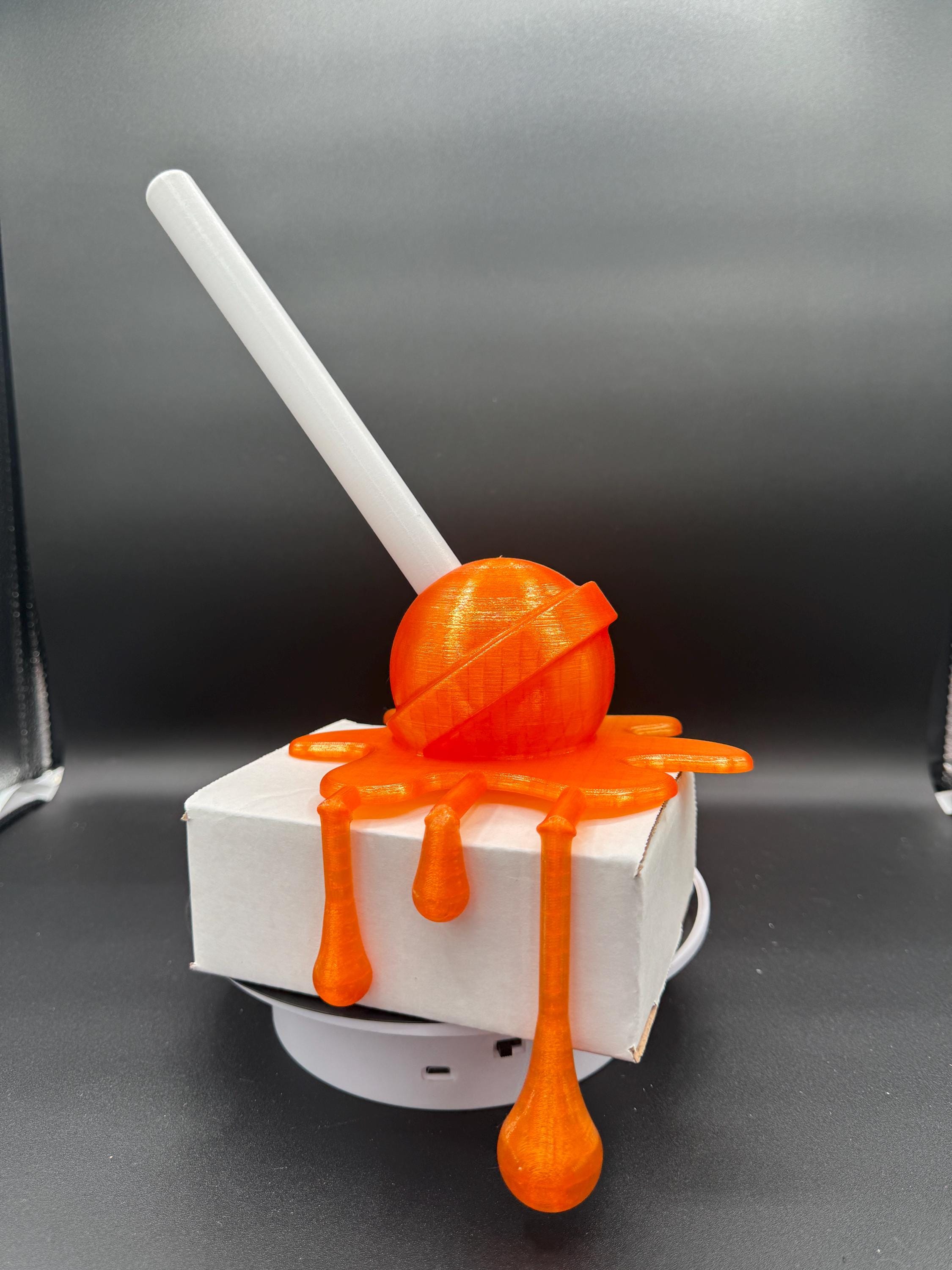 3D Printed Melting Lollipop Sculpture: Desk Decor, Choose Your Color