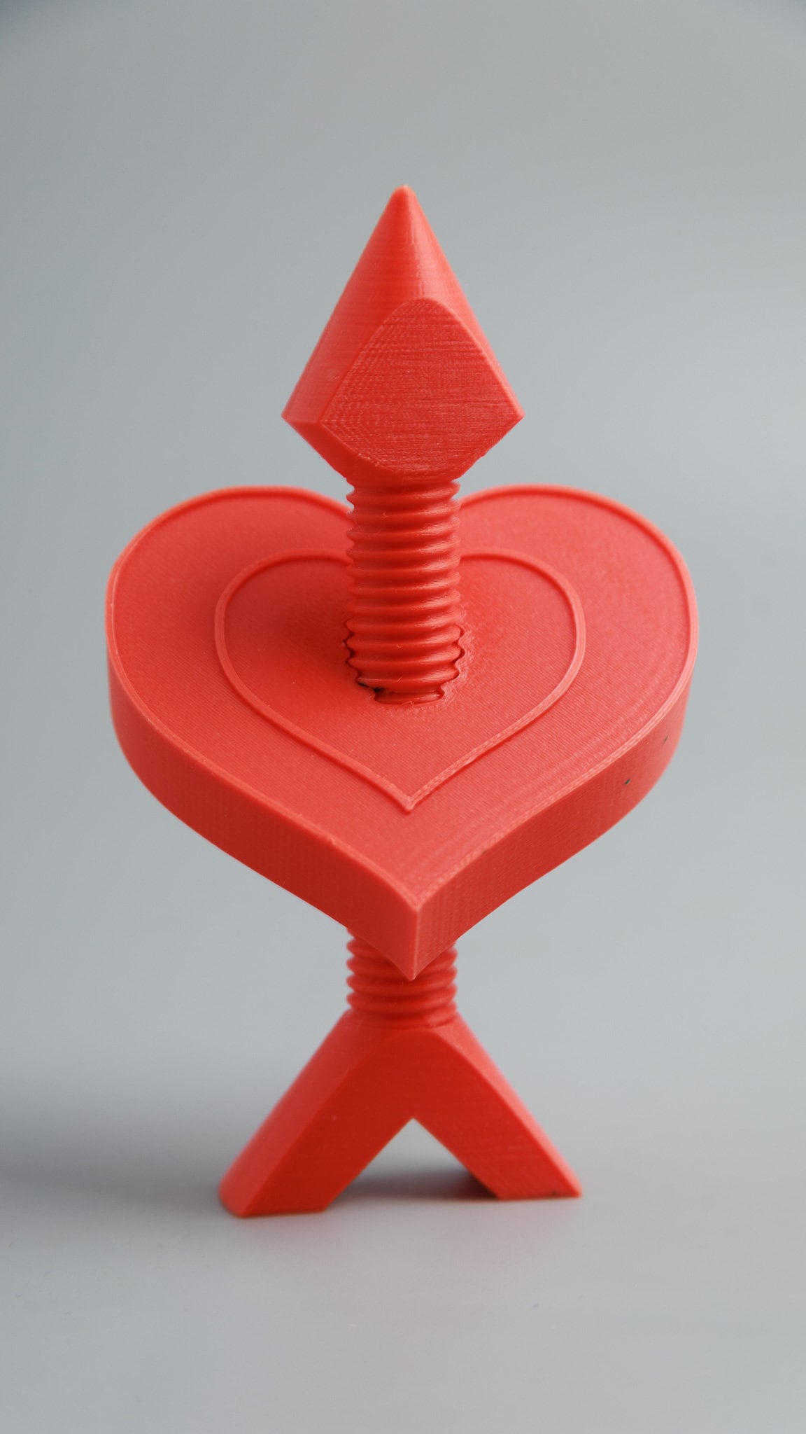 3D Printed Spinning Heart and Arrow Figurine: Kinetic Desk Toy