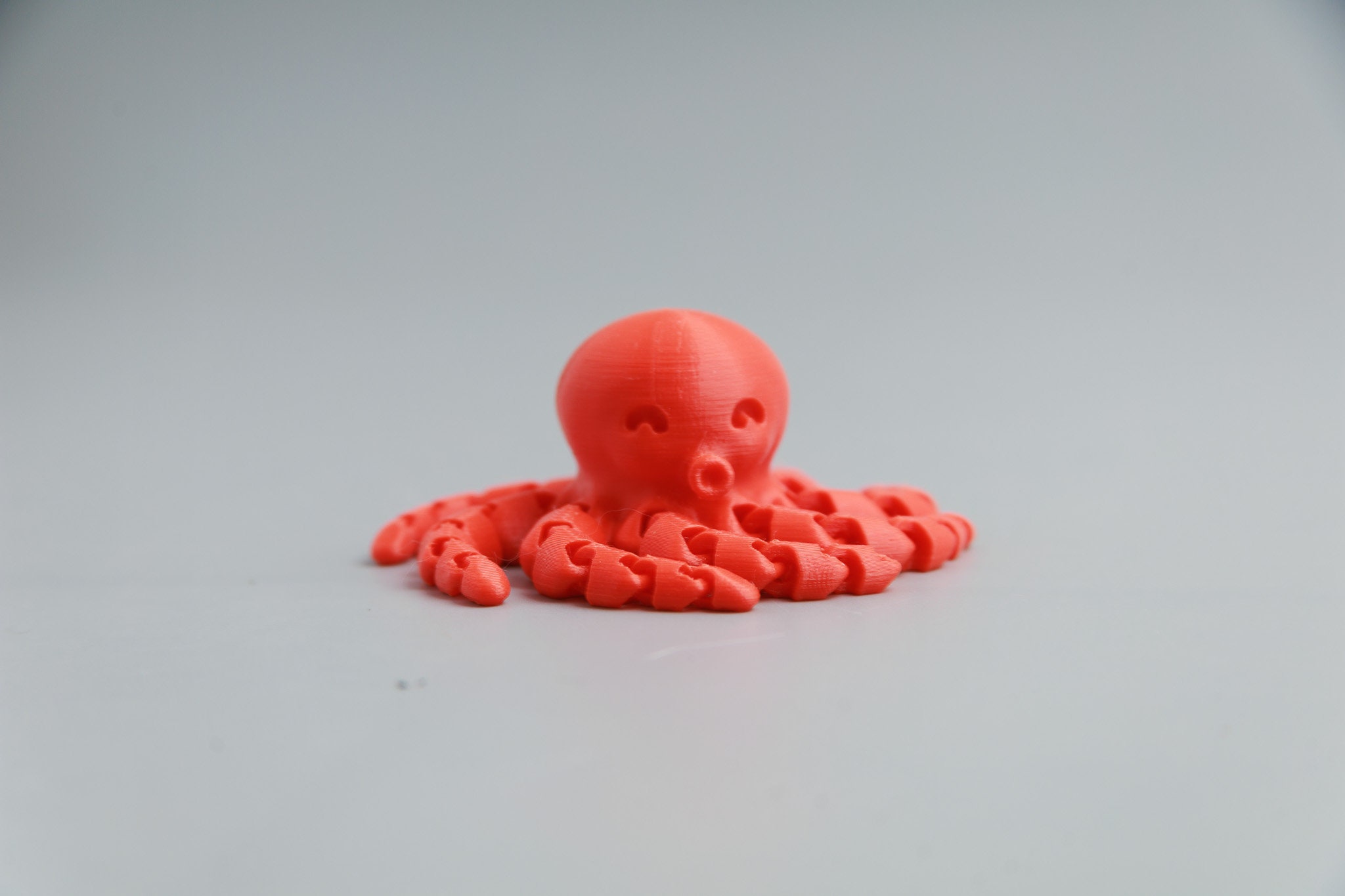 3D Printed Articulating Octopus Toy: Movable Legs, PLA Plastic
