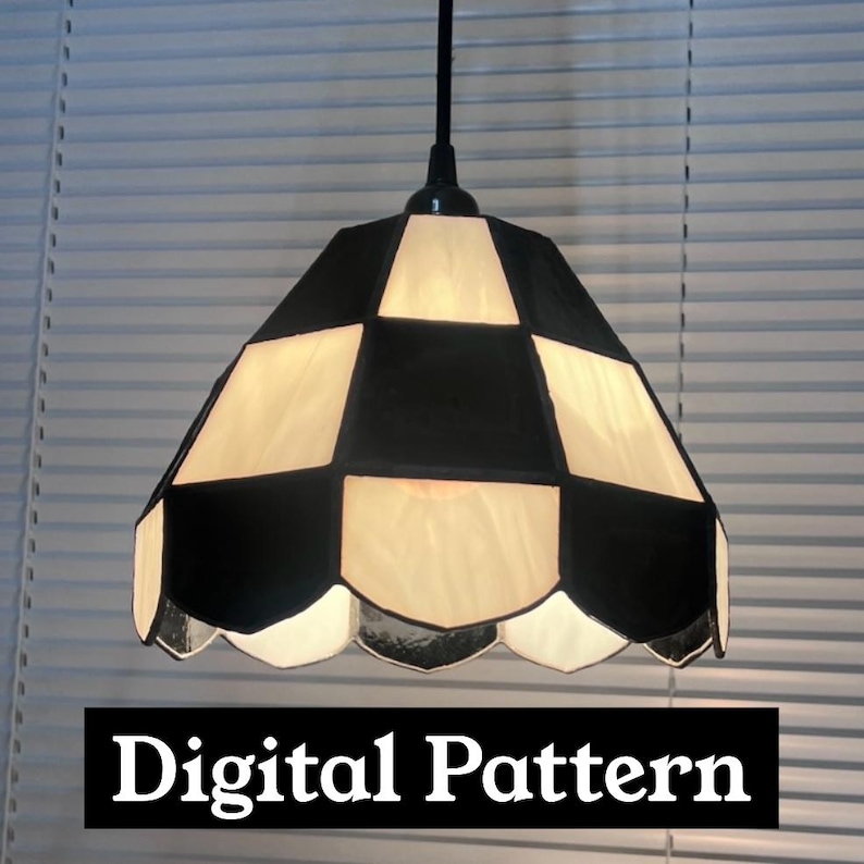 May include: A hanging pendant lamp with a black and white checkered shade. The shade is a geometric design with a scalloped edge. The text "Digital Pattern" is displayed in a black rectangle at the bottom of the image.