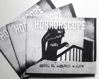 May include: Three black and white zines titled "HORRORSCOPE" with the text "A bi-monthly appreciation zine" and "INTRO TO MONSTER THEORY" on the front cover.