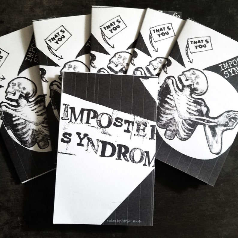 May include: A black and white zine titled "Imposter Syndrome" with a skeleton graphic and the text "That's You" repeated on the cover. The zine is a zine by Harjer Soodn.