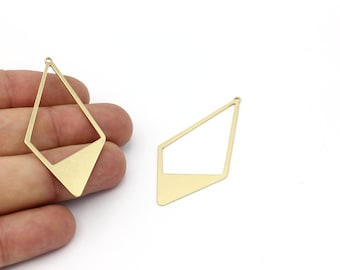 May include: Two gold-colored metal earring blanks in the shape of a diamond with a cut-out section. The blanks have a hole at the top for attaching a jump ring.