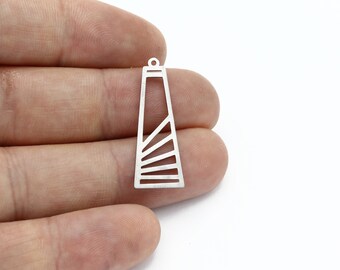 May include: Silver metal charm shaped like a lighthouse with a geometric design. The charm has a loop at the top for attaching to jewellery.
