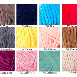 May include: A collection of colorful, plush yarn skeins in various shades, including Vison, Navy, Blue, Fuchsia, Anthracite, Yellow, Salmon, Caramel, Dried Rose, Light Rose, Larchmere, and Bone. Each skein is labeled with a number.
