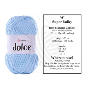 May include: A light blue ball of "dolce" super bulky yarn by YarnArt. The label indicates it is 100% MicroPolyester, 100 grams, and 120 meters. Suitable for baby blankets, toys, crochet, knitting, and accessories.