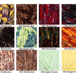 May include: A collection of colorful yarn skeins, each labeled with a number and the word "Multicolor" or a color name. The yarns display a variety of textures and shades, including yellow, brown, red, and green.