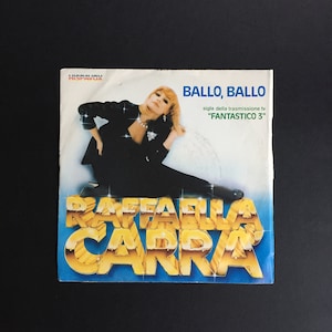 Vintage 45 rpm Vinyl Record from the 80s by the legendary Raffaella Carrà / Italian Television / Vintage Pop Music