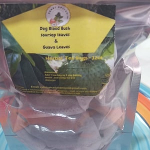 May include: A clear plastic bag containing 120 tea bags. The bag features a yellow label with the text "Dog Blood Bush soursop leaves & Guava Leaves Herbal Tea Bags - 120ct" and instructions for brewing the tea.
