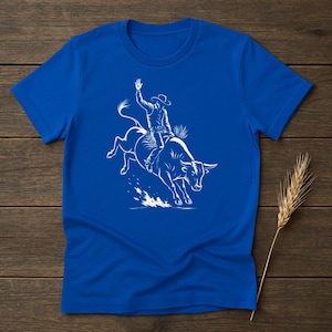 Cowboy Bull Riding Graphic Tee: Western Rodeo Shirt