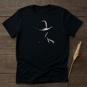 Mysterious Cowboy Silhouette T-Shirt, Western Theme Graphic Tee, Unique Noir Art Design, Minimalist Cowboy Shadow T-Shirt, Unisex Casual
