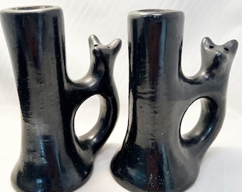 Pair of Vintage Santa Clara bear candle stick holders.