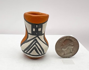 Mini handmade pot by Isleta artist P Jojola signed