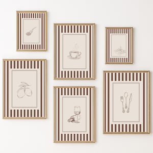 May include: A set of six framed art prints with gold frames and brown and cream striped borders. Each print features a different line drawing, including a spoon, coffee cup, food, lemons, wine, and silverware. The prints are displayed on a white wall.