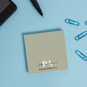 May include: A light gray square sticky note with the text "Physician Assistant" and "KAMLEE KLINE, PA-C" in black text.
