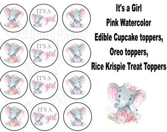 May include: Set of 10 edible cupcake toppers featuring a watercolor illustration of a pink and gray elephant with flowers. The toppers say "It's a girl" in pink lettering.