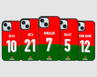 May include: Five different phone cases with the Portuguese national team colors and numbers. The cases feature the names "Silva", "Jota", "Ronaldo", "Dalot", and "Your Name" with the numbers 10, 21, 7, 5, and 12.