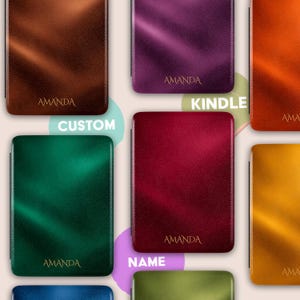 May include: A collection of rectangular Kindle covers in various colors including brown, purple, orange, green, red, and yellow. Each cover features a textured surface and the name AMANDA embossed in gold lettering at the bottom center.