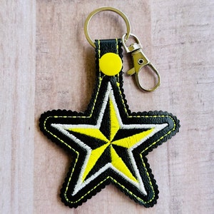 Shining Star Keychain - Handcrafted Celestial Key Accessory for Stylish Individuals.