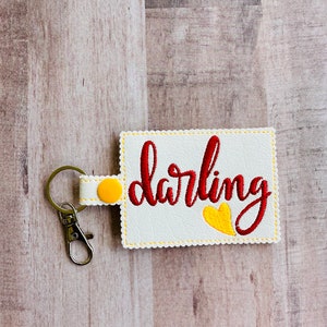 Darling Delights: Exquisite Handcrafted Keychain for a Touch of Elegance and Charm, Perfect Gift for Loved Ones and Special Occasions.