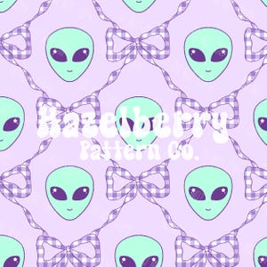 May include: A repeating pattern featuring light green alien faces with purple eyes and smiles, connected by purple and white gingham bows on a lavender background. The text "Hazelberry Pattern Co." is overlaid on the image.