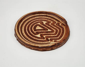 Amber and tan spoon rest