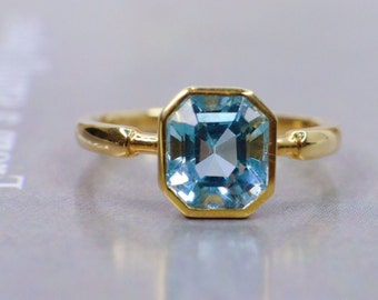 18k Solid Gold Aquamarine Ring: Emerald Cut Bezel Setting