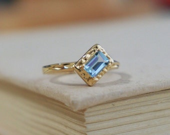 18k Gold Aquamarine Ring: Emerald Cut Gemstone, Dainty Twig Band