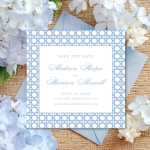 May include: A light blue and white Save the Date card with a woven pattern border. The card features the names Madison Harper and Harrison Maxwell, with the date June 10, 2025, and location Cape Cod, Massachusetts. The card is surrounded by blue and white flowers.
