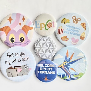 May include: A collection of seven circular pin-back buttons featuring various designs. One shows a purple dragon, another says Epcot, one displays food icons with the text Snacking Around The World, one has a geometric pattern, one says Got to go, my rat is here, one says Welcome Epcot Terrans, and one depicts a blue and orange structure.