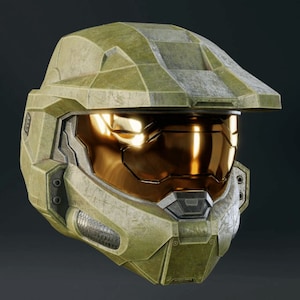 Peut inclure: Un casque vert et or avec une visière. Le casque a un aspect vieilli et usé.