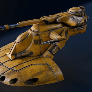 May include: A yellow, weathered, futuristic tank with a large cannon and a rounded, segmented body. The tank has a detailed, mechanical design with rivets and seams.