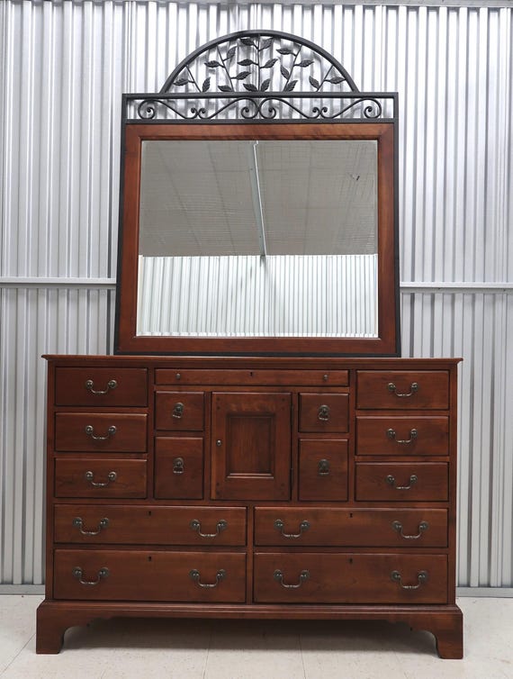 bureau dresser Phloem Studio Dorothy Bureau solid walnut wood chest of drawers. The  hardwood case has a grain matched waterfall miter from side to top to side.  The drawer fronts are grain matched. 8 main image 1