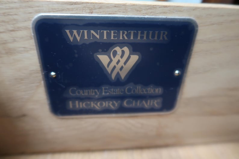May include: A blue and silver label with the text "Winterthur Country Estate Collection Hickory Chair".